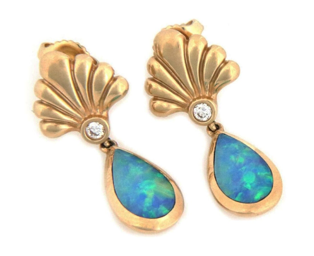 Kabana Floral Fire Opal Diamond 14k Yellow Gold Dangle Earrings: Kabana Floral Fire Opal Diamond 14k Yellow Gold Dangle Earrings These authentic Kabana dangle earrings are crafted from 14k yellow gold and feature a floral-inspired design. Each earring is adorned wi
