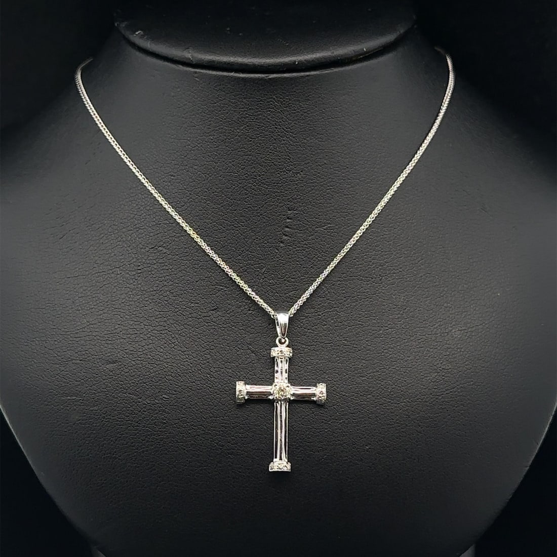 Diamond Cross Pendant on 20 Inch Wheat Chain in Vintage White Gold: Diamond Cross Pendant on 20 Inch Wheat Chain in Vintage White Gold This vintage necklace features a grooved cross pendant adorned with thirteen natural round brilliant cut diamonds totaling approximat