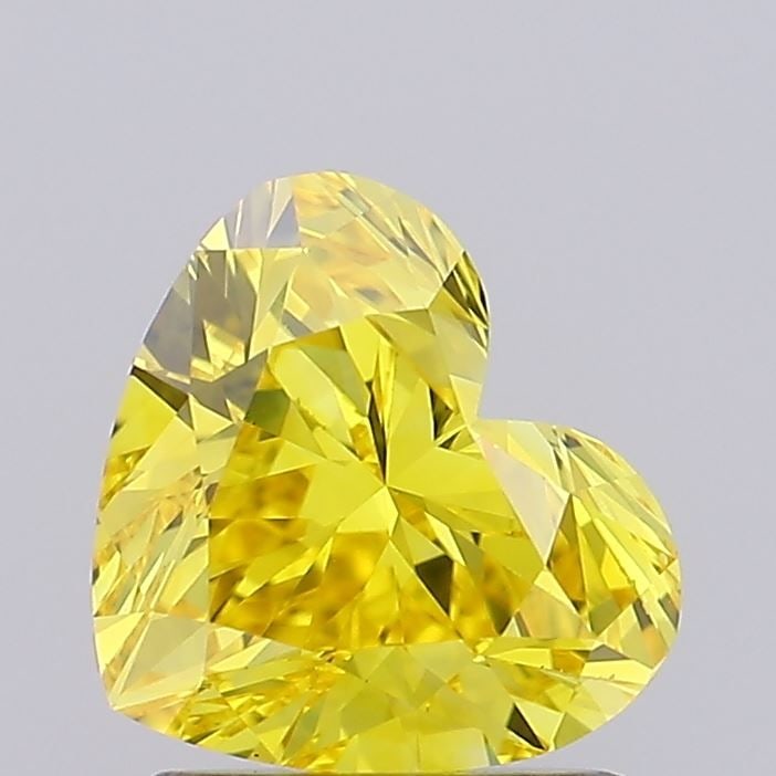 Loose Diamond - HEART 1.21ct Fancy Vivid Yellow VVS2: Loose Diamond - HEART 1.21ct Fancy Vivid Yellow VVS2 Source: This is a real non-mined Diamond that has been grown in a lab Shape: HEART Carats: 1.21 Color: Fancy Vivid Yellow Certification: NONE Video