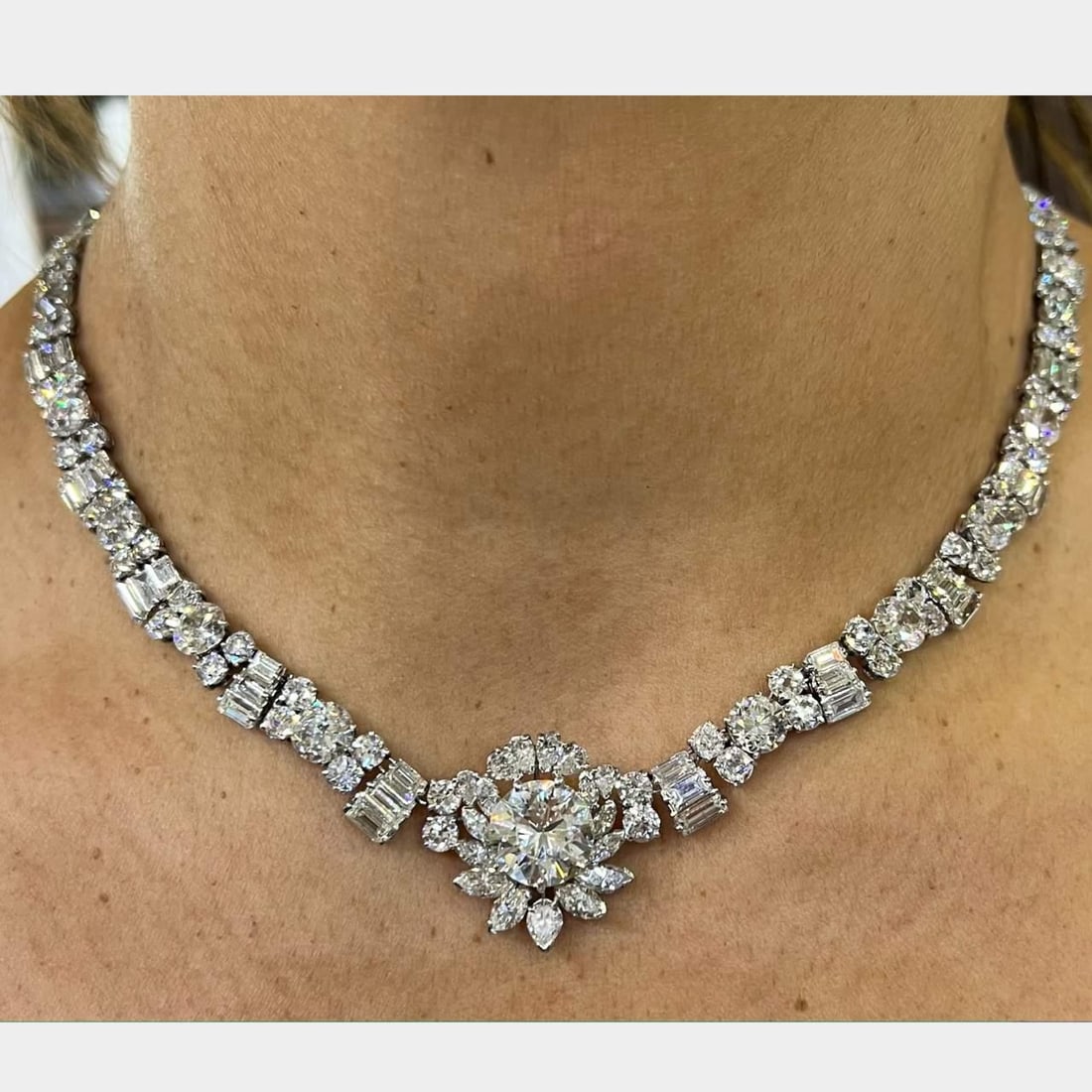 1950's Platinum Diamond Necklace 62.40 Ct GIA Certified 4.80 Ct Center: 1950's Platinum Diamond Necklace 62.40 Ct GIA Certified 4.80 Ct Center Step into elegance with this stunning 1950's Platinum Necklace, showcasing a breathtaking total weight of 62.40 Ct. of diamonds. 