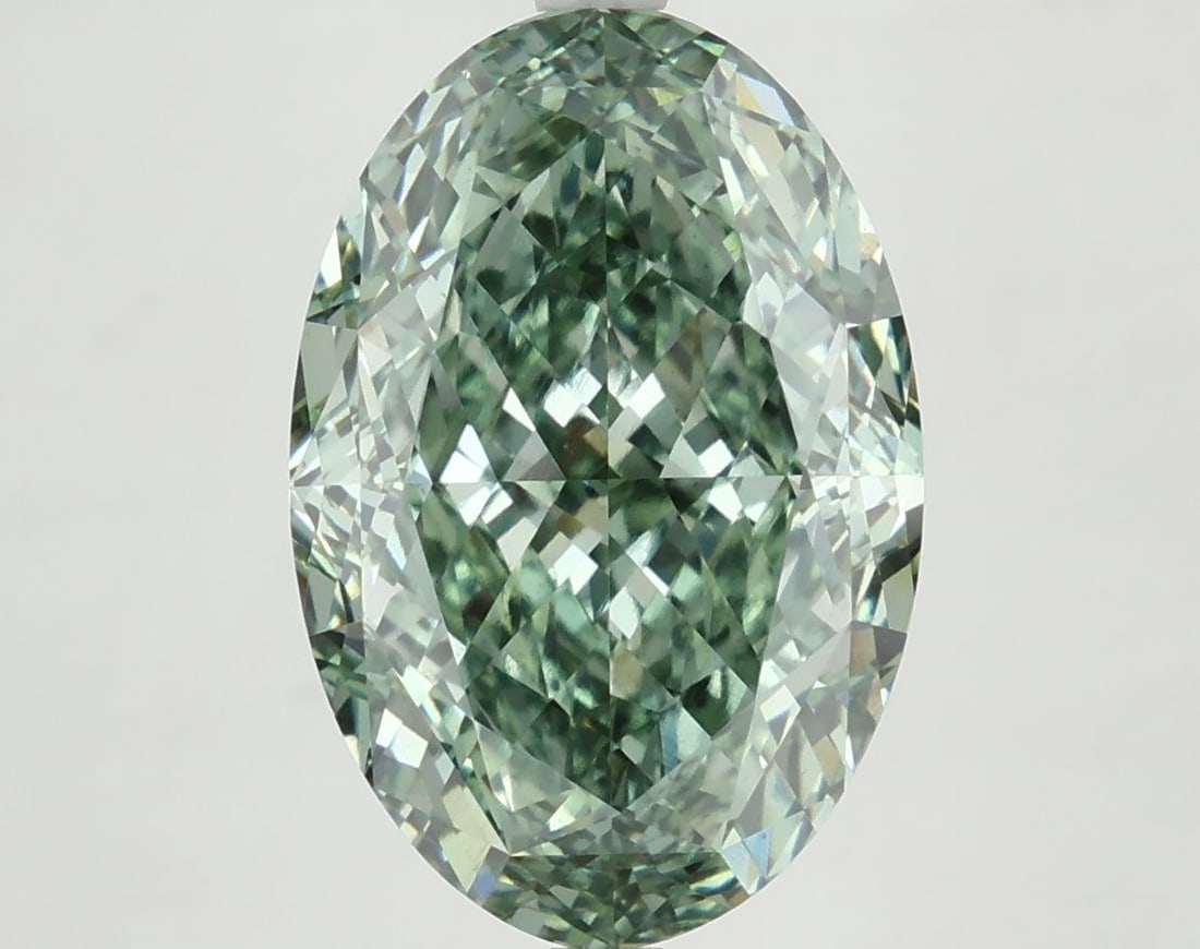 Loose Diamond - OVAL 7.23ct Fancy Vivid Green VS1: Loose Diamond - OVAL 7.23ct Fancy Vivid Green VS1 Source: This is a real non-mined Diamond that has been grown in a lab Shape: OVAL Carats: 7.23 Color: Fancy Vivid Green Certification: IGI Video: