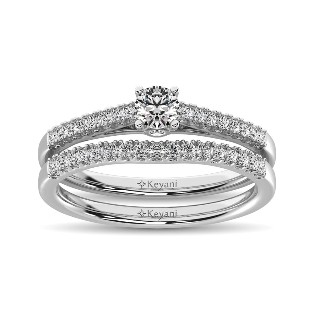 Diamond 1/2 Ct.Tw. Bridal Ring in 14K White Gold: Diamond 1/2 Ct.Tw. Bridal Ring in 14K White Gold 14k White Gold Stone Color: G-h Stone Clarity: Si2 Each ring is presented in standard size 6.5. Complimentary resizing is available between sizes 510 (