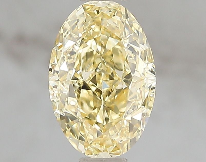 Loose Diamond - OVAL 1.54ct Fancy Vivid Yellow VVS2: Loose Diamond - OVAL 1.54ct Fancy Vivid Yellow VVS2 Source: This is a real non-mined Diamond that has been grown in a lab Shape: OVAL Carats: 1.54 Color: Fancy Vivid Yellow Certification: IGI Video:
