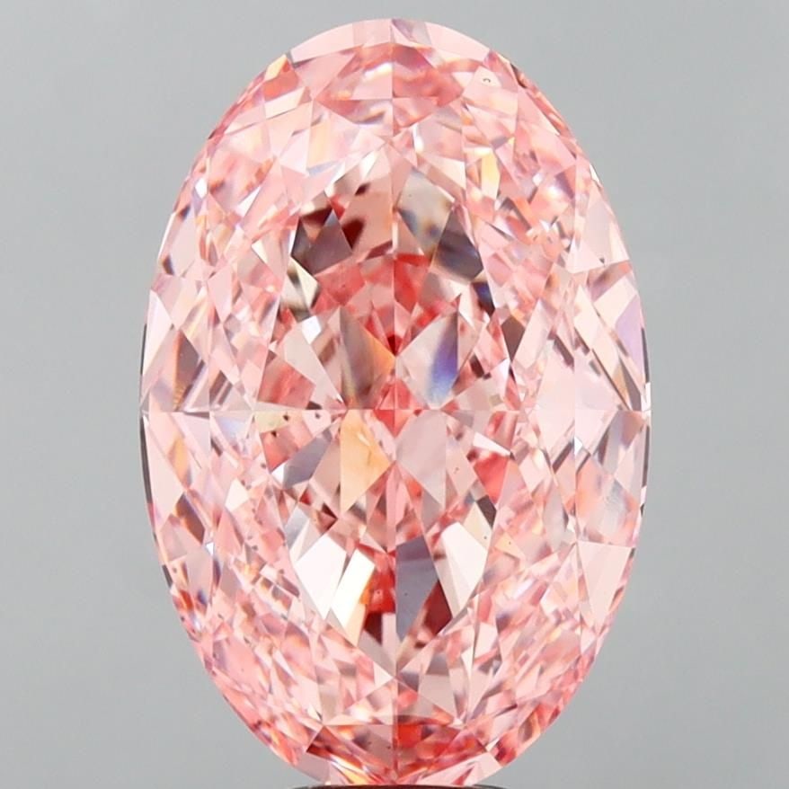 Loose Diamond - OVAL 10.54ct Fancy Vivid Pink VS1: Loose Diamond - OVAL 10.54ct Fancy Vivid Pink VS1 Source: This is a real non-mined Diamond that has been grown in a lab Shape: OVAL Carats: 10.54 Color: Fancy Vivid Pink Certification: IGI Video: