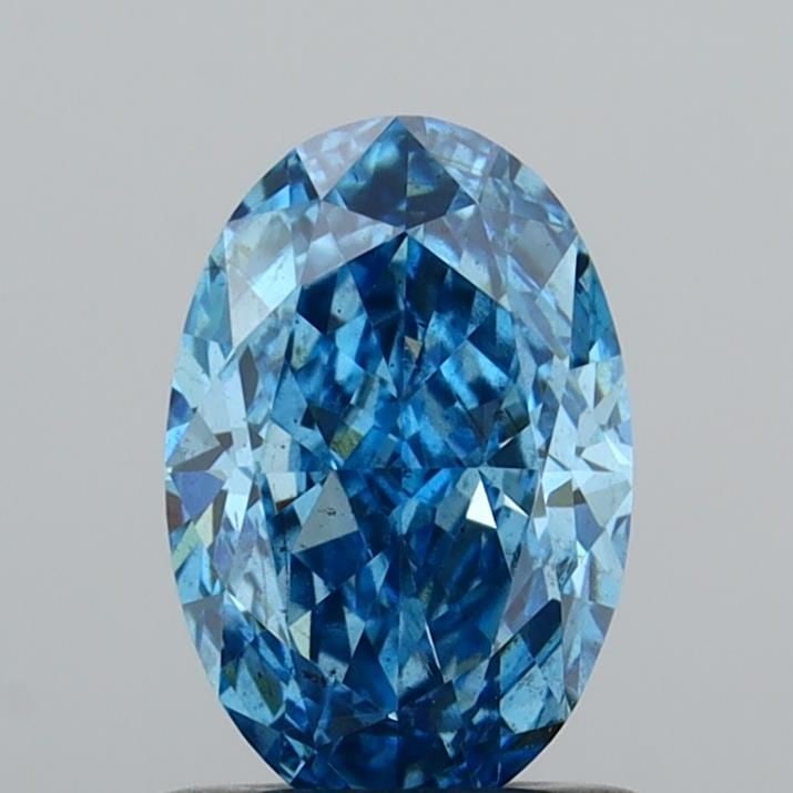 Loose Diamond - OVAL 1.03ct Fancy Vivid Blue SI1: Loose Diamond - OVAL 1.03ct Fancy Vivid Blue SI1 Source: This is a real non-mined Diamond that has been grown in a lab Shape: OVAL Carats: 1.03 Color: Fancy Vivid Blue Certification: IGI Video: