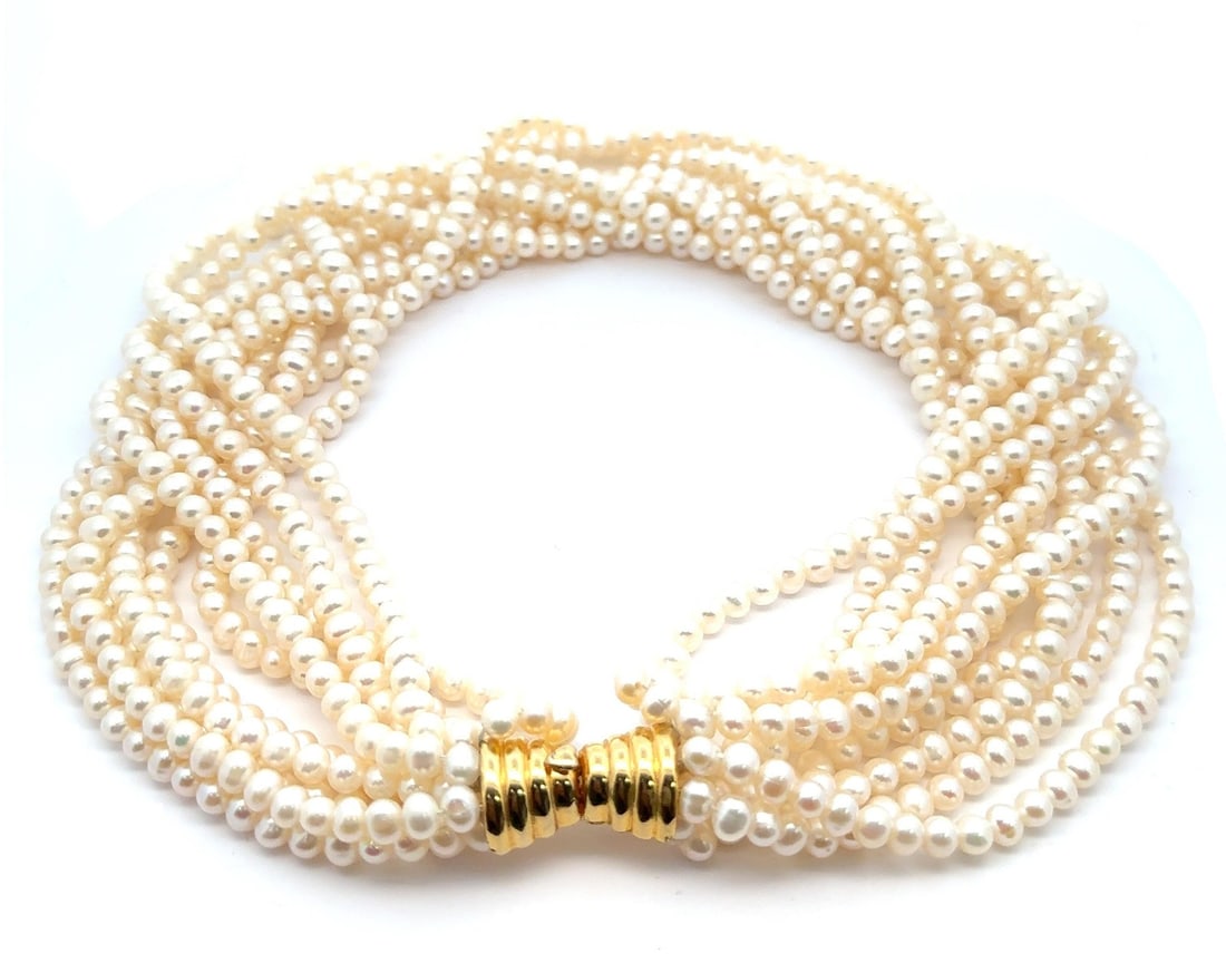 10 Strand Natural White Pearl Necklace with Yellow Tone Clasp: 10 Strand Natural White Pearl Necklace with Yellow Tone Clasp This stunning multi-strand necklace features numerous natural cultured pearls, each ranging from 4.7mm to 5.5mm in size, beautifully craft