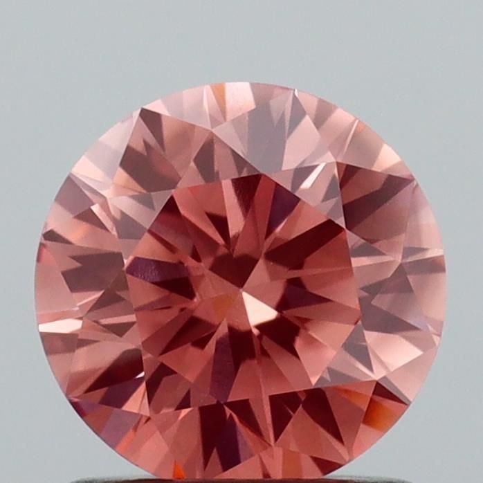 Ideal Loose Diamond - ROUND 1.06ct Fancy Vivid Brownish Pink VS1: Ideal Loose Diamond - ROUND 1.06ct Fancy Vivid Brownish Pink VS1 Source: This is a real non-mined Diamond that has been grown in a lab Shape: ROUND Carats: 1.06 Color: Fancy Vivid Brownish Pink