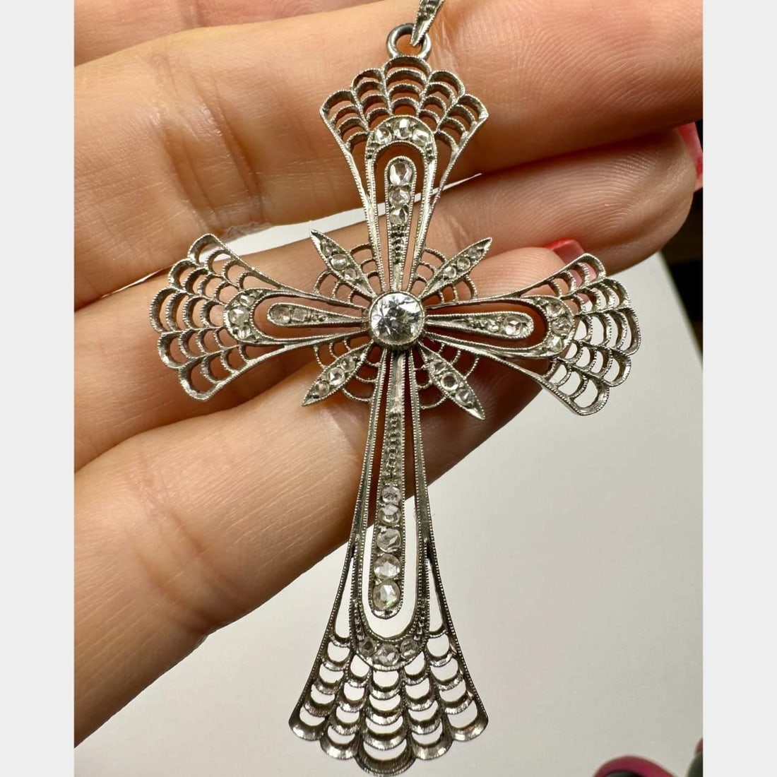 Antique Platinum 18K Diamond Cross Pendant 2.25 Inch: Antique Platinum 18K Diamond Cross Pendant 2.25 Inch This exquisite Antique Platinum and 18K Diamond Cross Pendant features a striking design that showcases both elegance and craftsmanship. Weighing 9