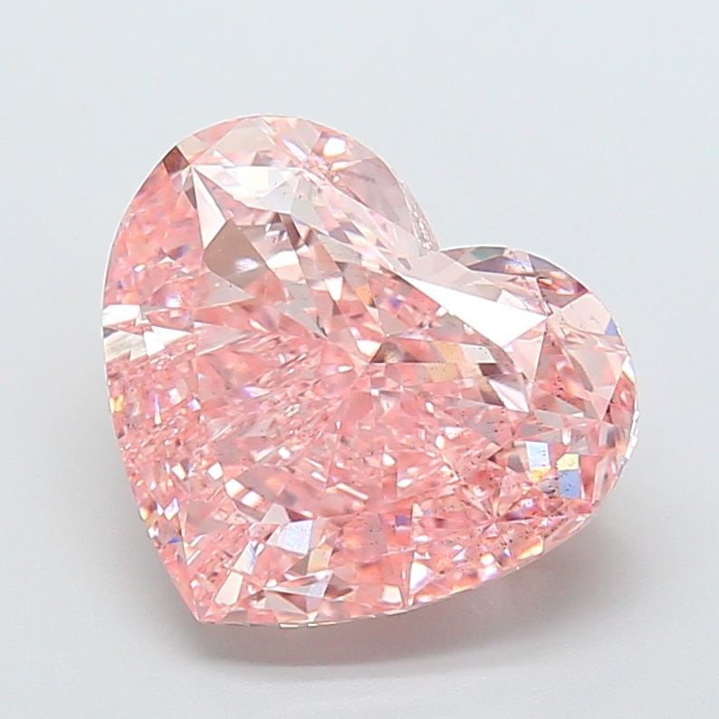 Loose Diamond - HEART 10.05ct Fancy Vivid Pink SI1: Loose Diamond - HEART 10.05ct Fancy Vivid Pink SI1 Source: This is a real non-mined Diamond that has been grown in a lab Shape: HEART Carats: 10.05 Color: Fancy Vivid Pink Certification: IGI Video: