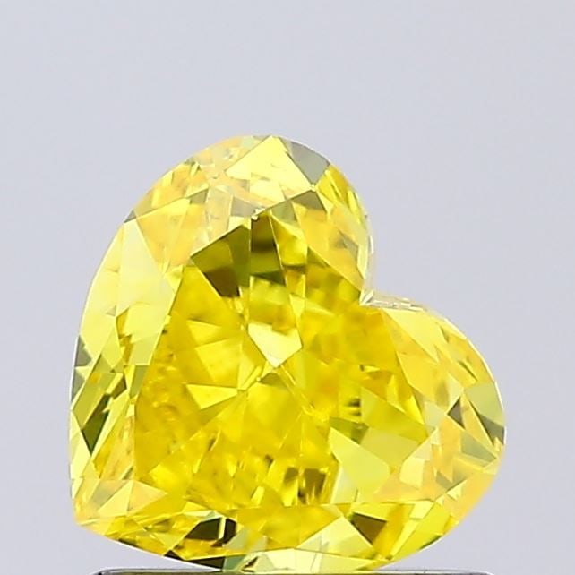 Loose Diamond - HEART 1.02ct Fancy Vivid Yellow VVS2: Loose Diamond - HEART 1.02ct Fancy Vivid Yellow VVS2 Source: This is a real non-mined Diamond that has been grown in a lab Shape: HEART Carats: 1.02 Color: Fancy Vivid Yellow Certification: NONE Video