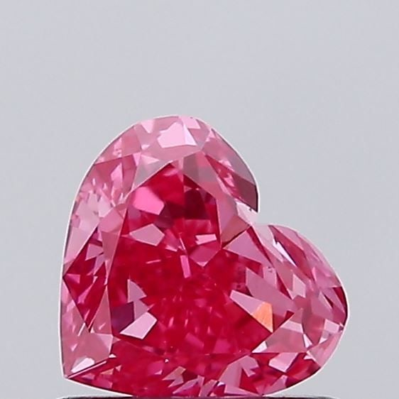 Loose Diamond - HEART 0.75ct Fancy Vivid Pink VS1: Loose Diamond - HEART 0.75ct Fancy Vivid Pink VS1 Source: This is a real non-mined Diamond that has been grown in a lab Shape: HEART Carats: 0.75 Color: Fancy Vivid Pink Certification: IGI Video: