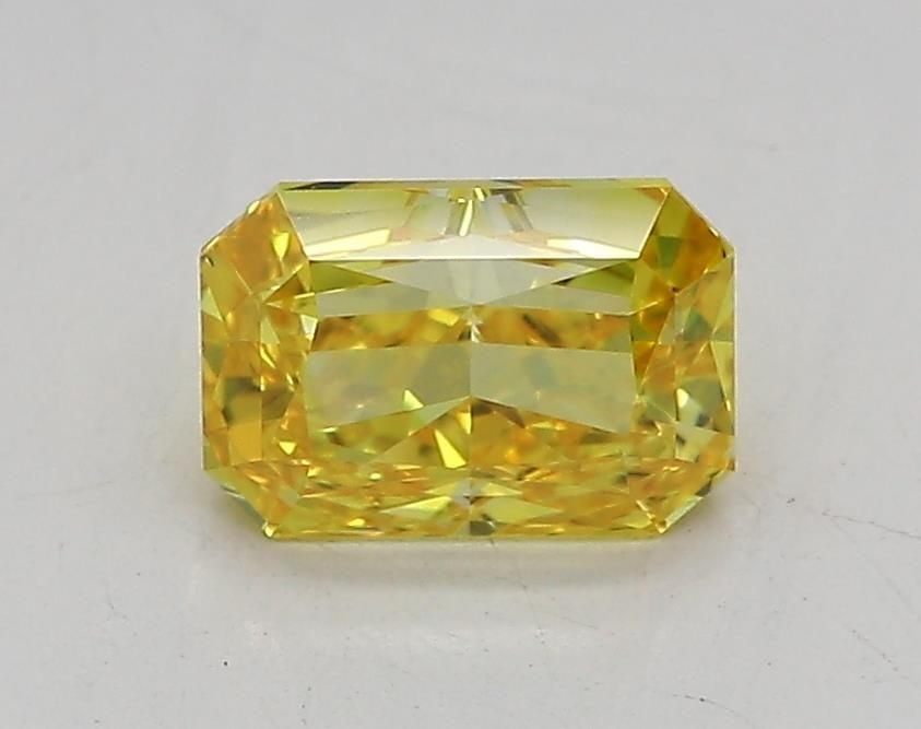 Loose Diamond - RADIANT 1.08ct Fancy Vivid Yellow IF: Loose Diamond - RADIANT 1.08ct Fancy Vivid Yellow IF Source: This is a real non-mined Diamond that has been grown in a lab Shape: RADIANT Carats: 1.08 Color: Fancy Vivid Yellow Certification: IGI Vide