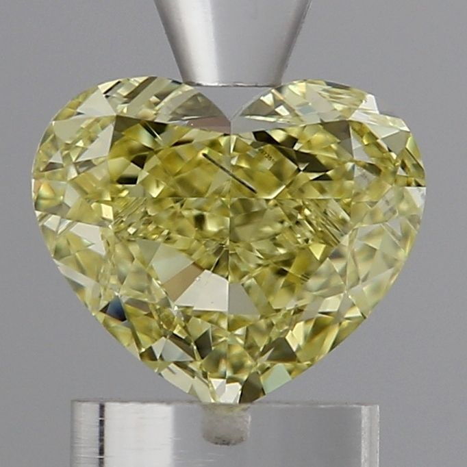 Loose Diamond - HEART 1.43ct Fancy Yellow SI1: Loose Diamond - HEART 1.43ct Fancy Yellow SI1 Source: This is a real non-mined Diamond that has been grown in a lab Shape: HEART Carats: 1.43 Color: Fancy Yellow Certification: IGI Video:
