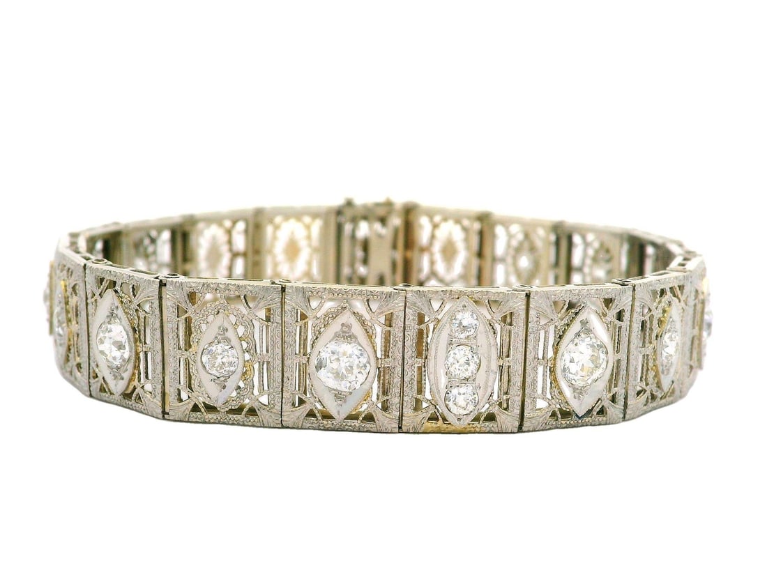 Art Deco 14K White Gold Diamond Filigree Bracelet 2.0ctw: Art Deco 14K White Gold Diamond Filigree Bracelet 2.0ctw This exquisite Antique Art Deco bracelet features a stunning design crafted from 14K solid white gold with a platinum top. Adorned with 17 natu