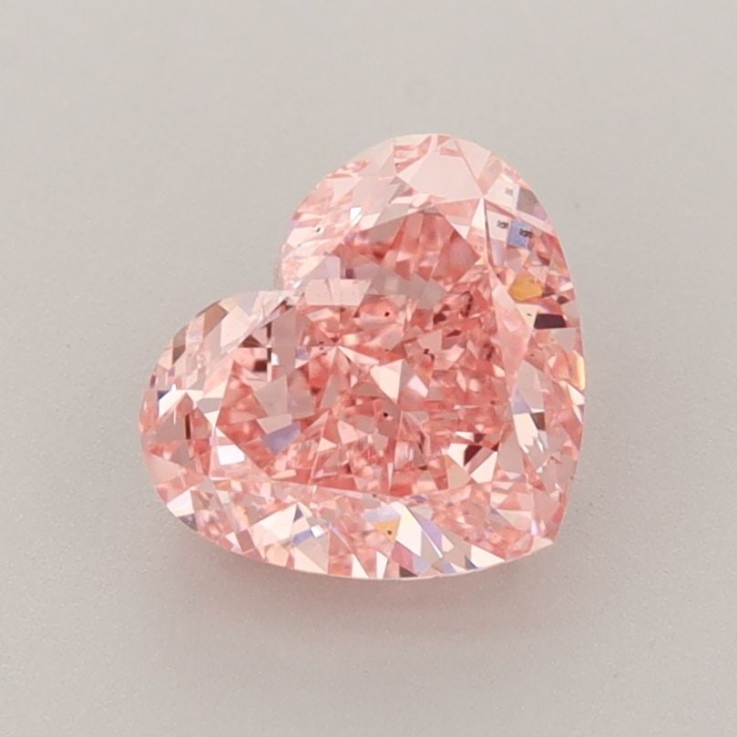 Loose Diamond - HEART 1.6ct Fancy Vivid Pink VS2: Loose Diamond - HEART 1.6ct Fancy Vivid Pink VS2 Source: This is a real non-mined Diamond that has been grown in a lab Shape: HEART Carats: 1.6 Color: Fancy Vivid Pink Certification: IGI Video: