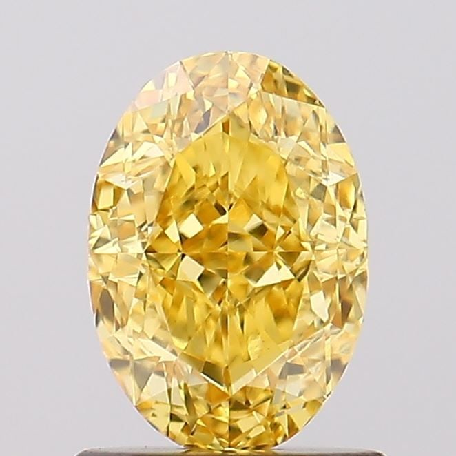 Loose Diamond - OVAL 1.15ct Fancy Vivid Yellow VVS2: Loose Diamond - OVAL 1.15ct Fancy Vivid Yellow VVS2 Source: This is a real non-mined Diamond that has been grown in a lab Shape: OVAL Carats: 1.15 Color: Fancy Vivid Yellow Certification: IGI Video:
