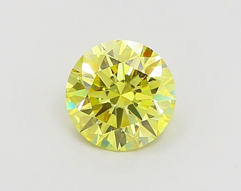 Ideal Loose Diamond - ROUND 1.19ct Fancy Vivid Yellow VVS2: Ideal Loose Diamond - ROUND 1.19ct Fancy Vivid Yellow VVS2 Source: This is a real non-mined Diamond that has been grown in a lab Shape: ROUND Carats: 1.19 Color: Fancy Vivid Yellow Certification: IGI 