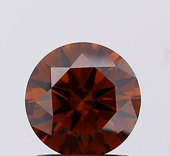 Ideal Loose Diamond - ROUND 1.07ct Fancy Deep Brown VS1: Ideal Loose Diamond - ROUND 1.07ct Fancy Deep Brown VS1 Source: This is a real non-mined Diamond that has been grown in a lab Shape: ROUND Carats: 1.07 Color: Fancy Deep Brown Certification: IGI Video