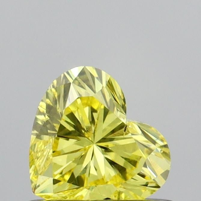 Loose Diamond - HEART 0.47ct Fancy Vivid Yellow SI1: Loose Diamond - HEART 0.47ct Fancy Vivid Yellow SI1 Source: This is a real non-mined Diamond that has been grown in a lab Shape: HEART Carats: 0.47 Color: Fancy Vivid Yellow Certification: IGI Video: