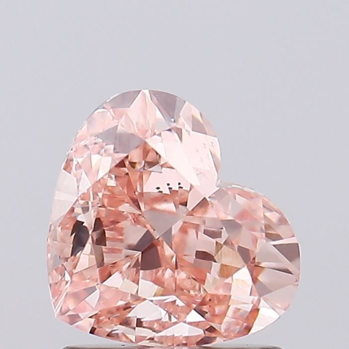 Loose Diamond - HEART 1.56ct Fancy Intense Pink VVS2: Loose Diamond - HEART 1.56ct Fancy Intense Pink VVS2 Source: This is a real non-mined Diamond that has been grown in a lab Shape: HEART Carats: 1.56 Color: Fancy Intense Pink Certification: IGI Video: