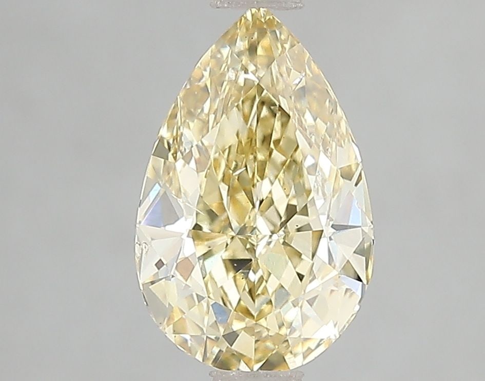 Loose Diamond - PEAR 2.01ct Fancy Intense Yellow SI1: Loose Diamond - PEAR 2.01ct Fancy Intense Yellow SI1 Source: This is a real non-mined Diamond that has been grown in a lab Shape: PEAR Carats: 2.01 Color: Fancy Intense Yellow Certification: IGI Video