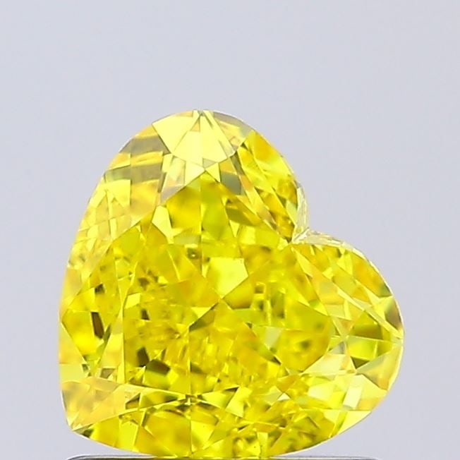 Loose Diamond - HEART 1.04ct Fancy Vivid Yellow VVS2: Loose Diamond - HEART 1.04ct Fancy Vivid Yellow VVS2 Source: This is a real non-mined Diamond that has been grown in a lab Shape: HEART Carats: 1.04 Color: Fancy Vivid Yellow Certification: NONE Video