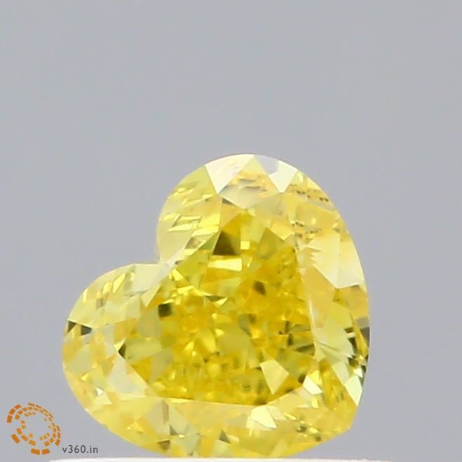 Loose Diamond - HEART 0.61ct Fancy Vivid Yellow VS1: Loose Diamond - HEART 0.61ct Fancy Vivid Yellow VS1 Source: This is a real non-mined Diamond that has been grown in a lab Shape: HEART Carats: 0.61 Color: Fancy Vivid Yellow Certification: IGI Video:
