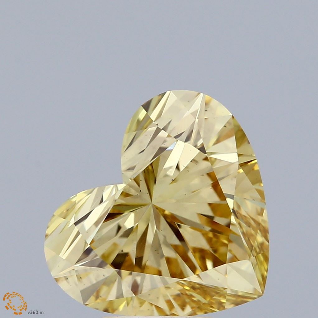 Loose Diamond - HEART 5.01ct Fancy Vivid Yellow VS2: Loose Diamond - HEART 5.01ct Fancy Vivid Yellow VS2 Source: This is a real non-mined Diamond that has been grown in a lab Shape: HEART Carats: 5.01 Color: Fancy Vivid Yellow Certification: IGI Video: