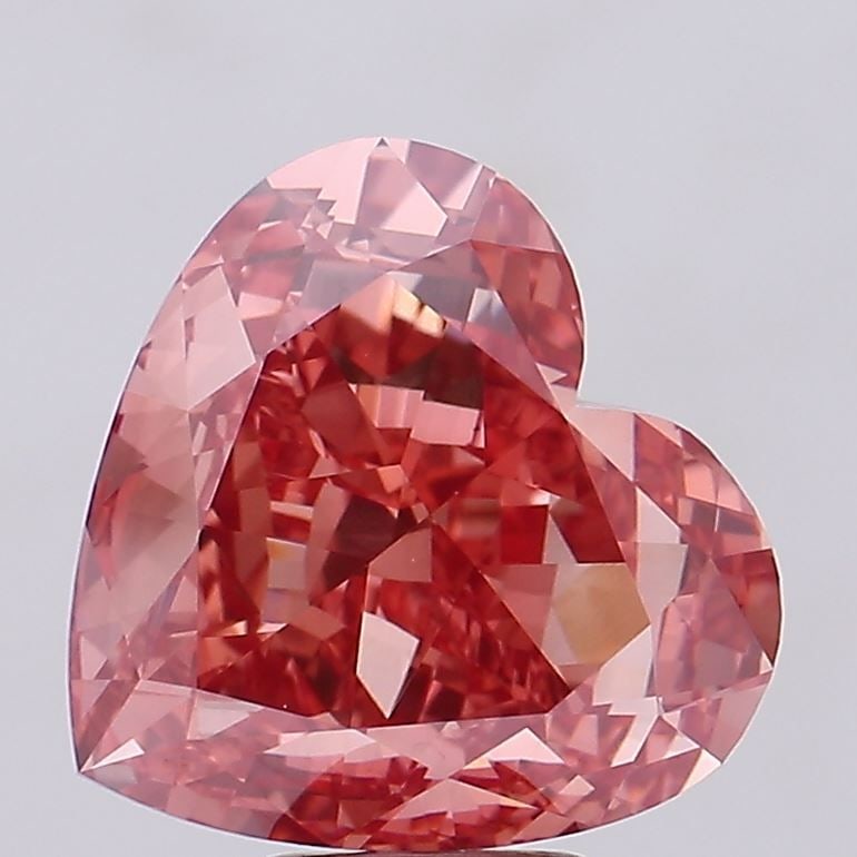 Loose Diamond - HEART 10.1ct Fancy Vivid Brownish Pink VVS2: Loose Diamond - HEART 10.1ct Fancy Vivid Brownish Pink VVS2 Source: This is a real non-mined Diamond that has been grown in a lab Shape: HEART Carats: 10.1 Color: Fancy Vivid Brownish Pink Certificati