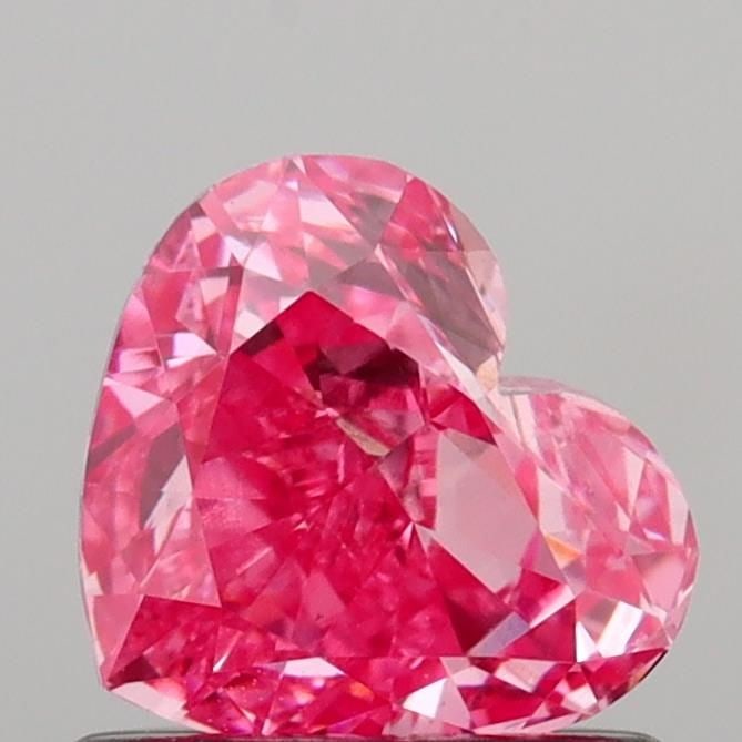 Loose Diamond - HEART 0.81ct Fancy Vivid Pink VS1: Loose Diamond - HEART 0.81ct Fancy Vivid Pink VS1 Source: This is a real non-mined Diamond that has been grown in a lab Shape: HEART Carats: 0.81 Color: Fancy Vivid Pink Certification: IGI Video: