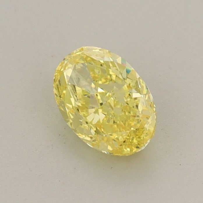 Loose Diamond - OVAL 0.52ct Fancy Vivid Yellow VS1: Loose Diamond - OVAL 0.52ct Fancy Vivid Yellow VS1 Source: This is a real non-mined Diamond that has been grown in a lab Shape: OVAL Carats: 0.52 Color: Fancy Vivid Yellow Certification: IGI Video: