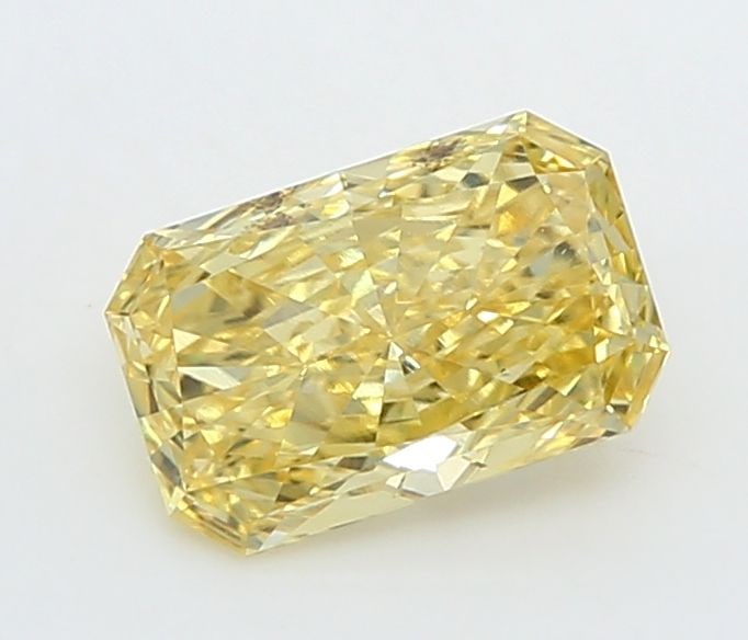 Loose Diamond - RADIANT 0.89ct Fancy Vivid Yellow VS1: Loose Diamond - RADIANT 0.89ct Fancy Vivid Yellow VS1 Source: This is a real non-mined Diamond that has been grown in a lab Shape: RADIANT Carats: 0.89 Color: Fancy Vivid Yellow Certification: IGI Vid