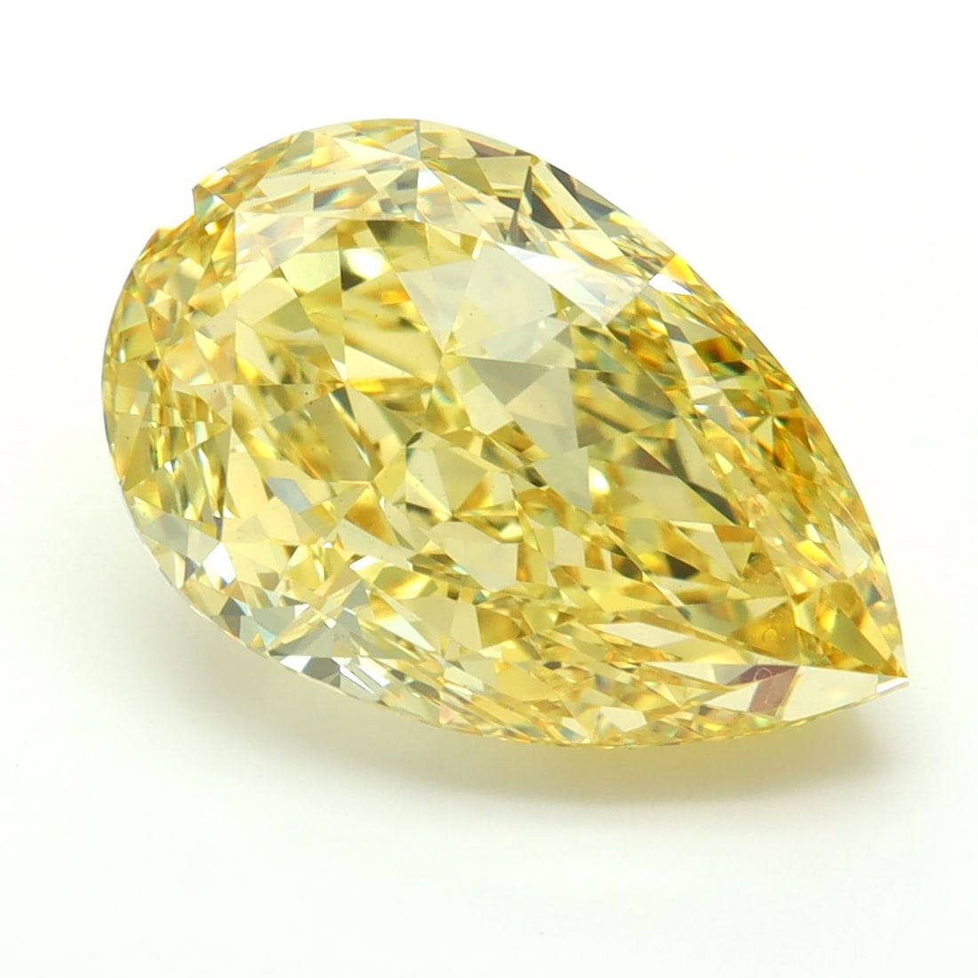 Loose Diamond - PEAR 7.55ct Fancy Vivid Yellow VS1: Loose Diamond - PEAR 7.55ct Fancy Vivid Yellow VS1 Source: This is a real non-mined Diamond that has been grown in a lab Shape: PEAR Carats: 7.55 Color: Fancy Vivid Yellow Certification: IGI Video: