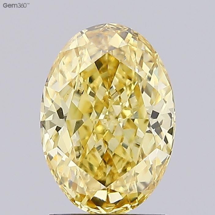 Loose Diamond - OVAL 2.12ct Fancy Vivid Yellow VS1: Loose Diamond - OVAL 2.12ct Fancy Vivid Yellow VS1 Source: This is a real non-mined Diamond that has been grown in a lab Shape: OVAL Carats: 2.12 Color: Fancy Vivid Yellow Certification: IGI Video: