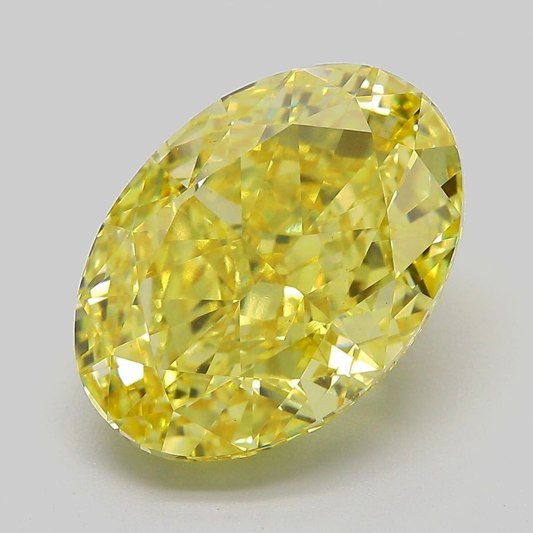 Loose Diamond - OVAL 8.57ct Fancy Vivid Yellow VS1: Loose Diamond - OVAL 8.57ct Fancy Vivid Yellow VS1 Source: This is a real non-mined Diamond that has been grown in a lab Shape: OVAL Carats: 8.57 Color: Fancy Vivid Yellow Certification: IGI Video: