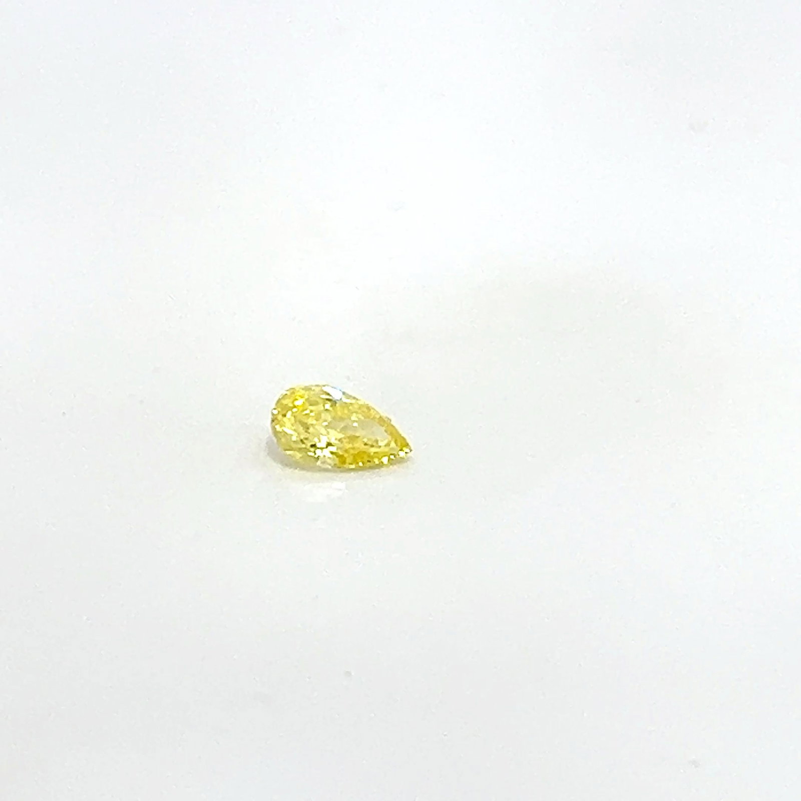 Loose Diamond - PEAR 0.38ct Fancy Yellow VS2: Loose Diamond - PEAR 0.38ct Fancy Yellow VS2 Source: This is a real non-mined Diamond that has been grown in a lab Shape: PEAR Carats: 0.38 Color: Fancy Yellow Certification: NONE The Diamond Depot Gu