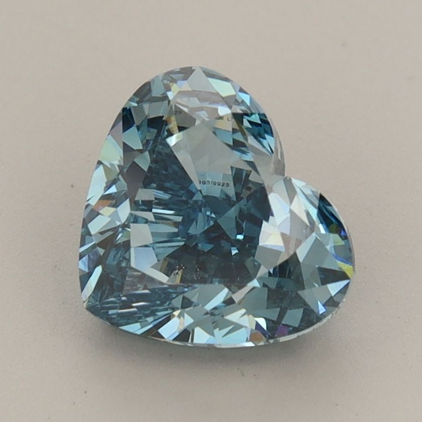 Loose Diamond - HEART 2.1ct Fancy Vivid Blue VS2: Loose Diamond - HEART 2.1ct Fancy Vivid Blue VS2 Source: This is a real non-mined Diamond that has been grown in a lab Shape: HEART Carats: 2.1 Color: Fancy Vivid Blue Certification: IGI Video: