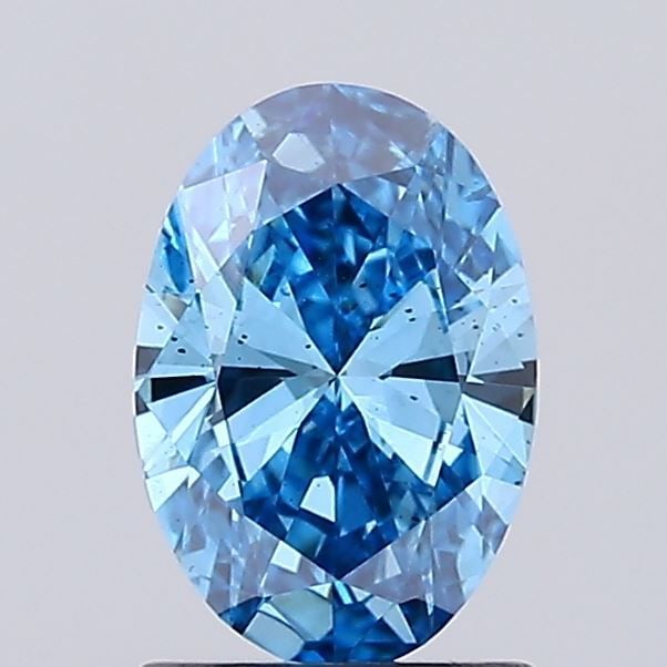Loose Diamond - OVAL 1.0ct Fancy Vivid Blue VS2: Loose Diamond - OVAL 1.0ct Fancy Vivid Blue VS2 Source: This is a real non-mined Diamond that has been grown in a lab Shape: OVAL Carats: 1.0 Color: Fancy Vivid Blue Certification: NONE Video: