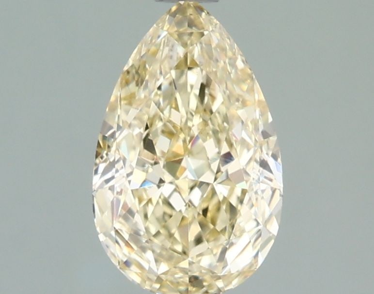 Loose Diamond - PEAR 1.31ct Fancy Yellow VVS2: Loose Diamond - PEAR 1.31ct Fancy Yellow VVS2 Source: This is a real non-mined Diamond that has been grown in a lab Shape: PEAR Carats: 1.31 Color: Fancy Yellow Certification: IGI Video: