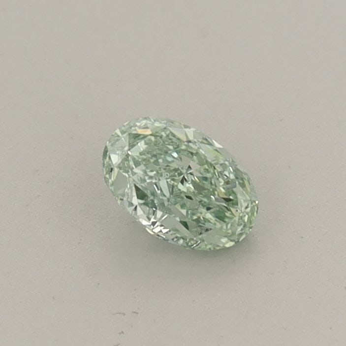Loose Diamond - OVAL 0.26ct Fancy Vivid Green VS2: Loose Diamond - OVAL 0.26ct Fancy Vivid Green VS2 Source: This is a real non-mined Diamond that has been grown in a lab Shape: OVAL Carats: 0.26 Color: Fancy Vivid Green Certification: IGI The Diamond