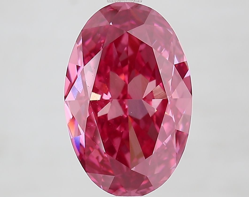 Loose Diamond - OVAL 4.04ct Fancy Vivid Pink VVS2: Loose Diamond - OVAL 4.04ct Fancy Vivid Pink VVS2 Source: This is a real non-mined Diamond that has been grown in a lab Shape: OVAL Carats: 4.04 Color: Fancy Vivid Pink Certification: IGI Video: