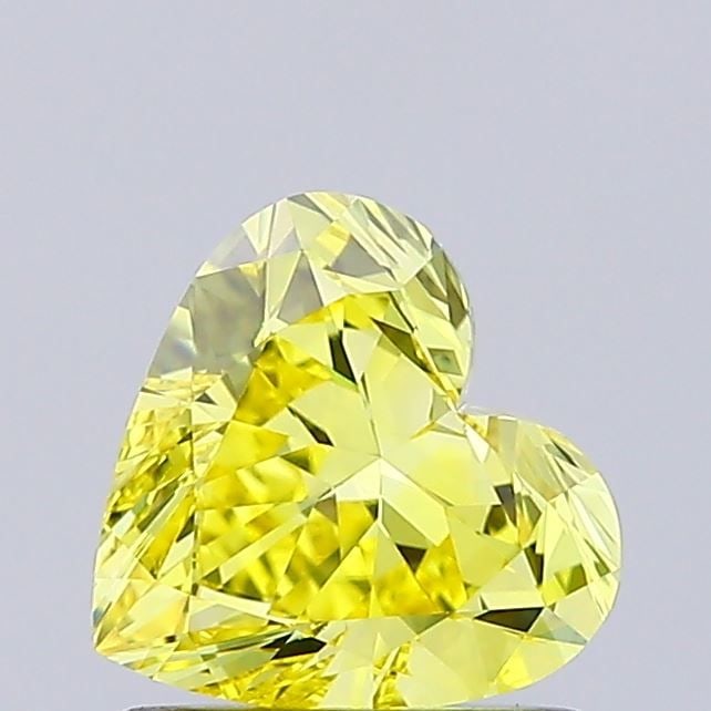 Loose Diamond - HEART 0.98ct Fancy Vivid Yellow VVS2: Loose Diamond - HEART 0.98ct Fancy Vivid Yellow VVS2 Source: This is a real non-mined Diamond that has been grown in a lab Shape: HEART Carats: 0.98 Color: Fancy Vivid Yellow Certification: IGI Video:
