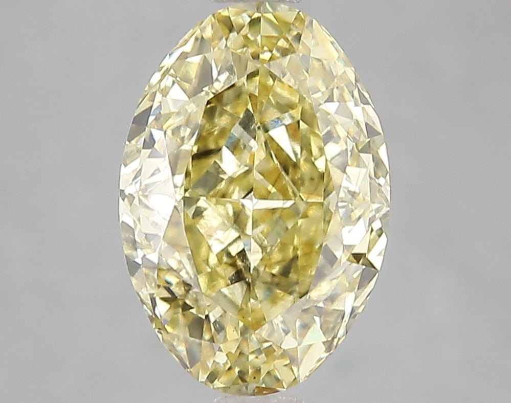 Loose Diamond - OVAL 3.1ct Fancy Intense Yellow SI1: Loose Diamond - OVAL 3.1ct Fancy Intense Yellow SI1 Source: This is a real non-mined Diamond that has been grown in a lab Shape: OVAL Carats: 3.1 Color: Fancy Intense Yellow Certification: IGI Video: