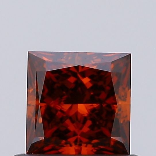 Loose Diamond - PRINCESS 0.58ct Fancy Vivid Orange VVS2: Loose Diamond - PRINCESS 0.58ct Fancy Vivid Orange VVS2 Source: This is a real non-mined Diamond that has been grown in a lab Shape: PRINCESS Carats: 0.58 Color: Fancy Vivid Orange Certification: IGI 