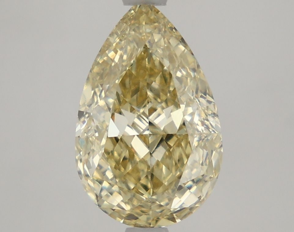 Loose Diamond - PEAR 3.12ct Fancy Yellow VS1: Loose Diamond - PEAR 3.12ct Fancy Yellow VS1 Source: This is a real non-mined Diamond that has been grown in a lab Shape: PEAR Carats: 3.12 Color: Fancy Yellow Certification: IGI Video: