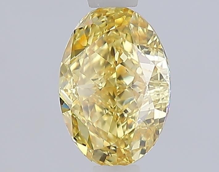 Loose Diamond - OVAL 1.1ct Fancy Vivid Yellow VS1: Loose Diamond - OVAL 1.1ct Fancy Vivid Yellow VS1 Source: This is a real non-mined Diamond that has been grown in a lab Shape: OVAL Carats: 1.1 Color: Fancy Vivid Yellow Certification: IGI Video: