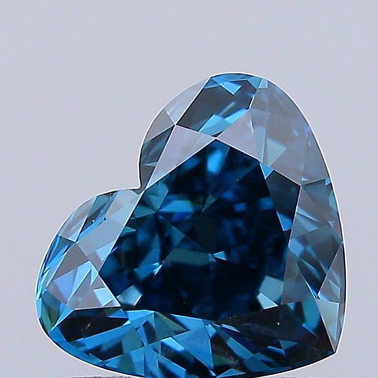 Loose Diamond - HEART 0.95ct Fancy Vivid Blue VVS2: Loose Diamond - HEART 0.95ct Fancy Vivid Blue VVS2 Source: This is a real non-mined Diamond that has been grown in a lab Shape: HEART Carats: 0.95 Color: Fancy Vivid Blue Certification: IGI Video:
