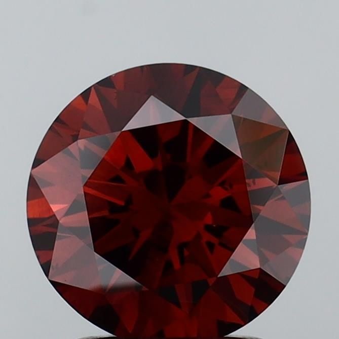 Loose Diamond - ROUND 2.03ct Fancy Orangey Brown SI1: Loose Diamond - ROUND 2.03ct Fancy Orangey Brown SI1 Source: This is a real non-mined Diamond that has been grown in a lab Shape: ROUND Carats: 2.03 Color: Fancy Orangey Brown Certification: IGI Video