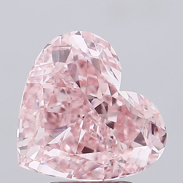 Loose Diamond - HEART 5.0ct Fancy Vivid Pink VS2: Loose Diamond - HEART 5.0ct Fancy Vivid Pink VS2 Source: This is a real non-mined Diamond that has been grown in a lab Shape: HEART Carats: 5.0 Color: Fancy Vivid Pink Certification: IGI Video: