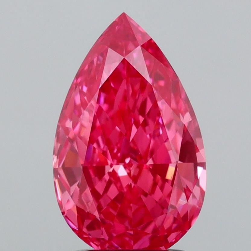 Loose Diamond - PEAR 1.55ct Fancy Vivid Pink VVS2: Loose Diamond - PEAR 1.55ct Fancy Vivid Pink VVS2 Source: This is a real non-mined Diamond that has been grown in a lab Shape: PEAR Carats: 1.55 Color: Fancy Vivid Pink Certification: IGI Video: